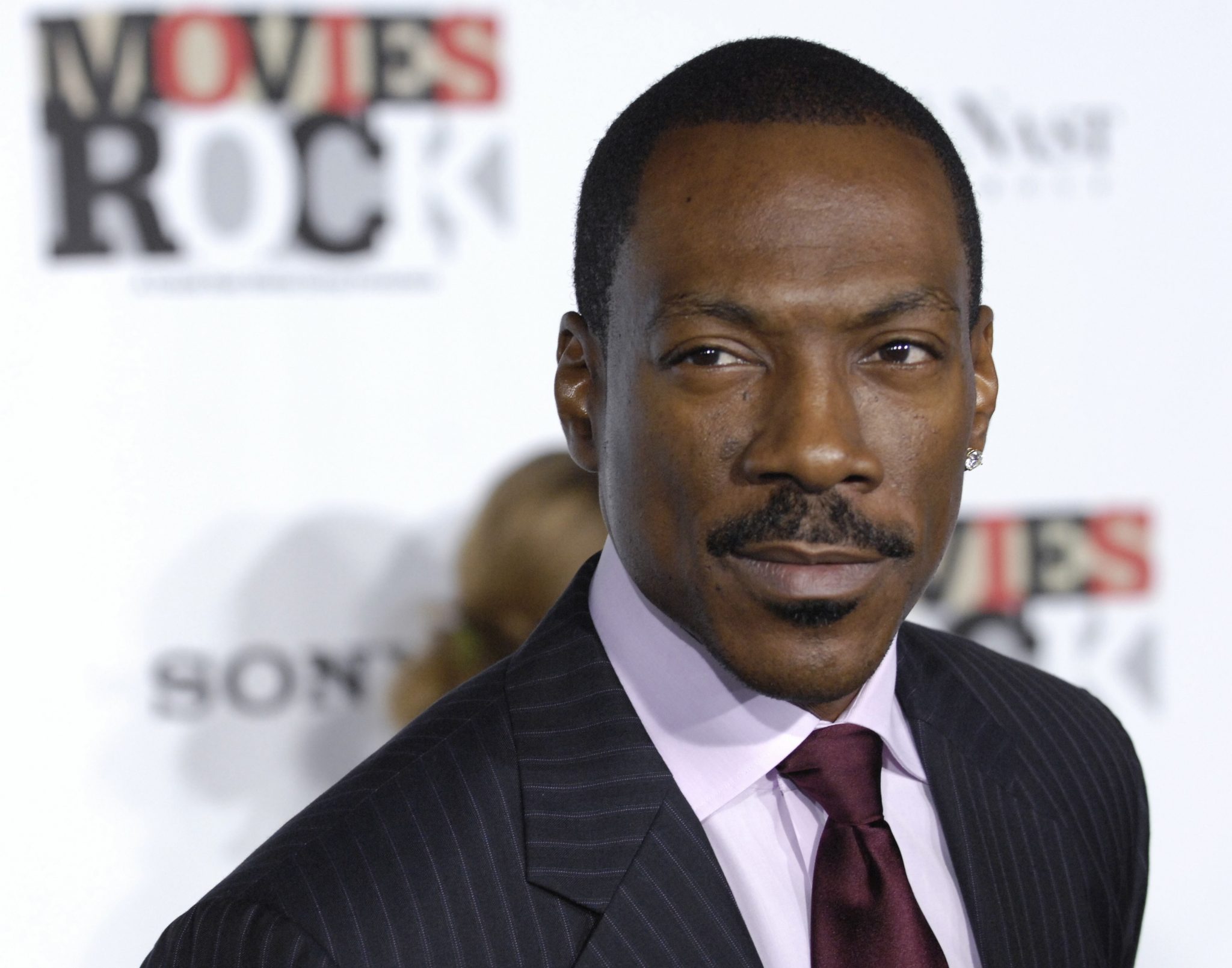 Eddie Murphy arrives at "Movies Rock: A Celebration of Music in Film," at the Kodak Theater in Los Angeles, Sunday, Dec. 2, 2007. (AP Photo/Chris Pizzello)